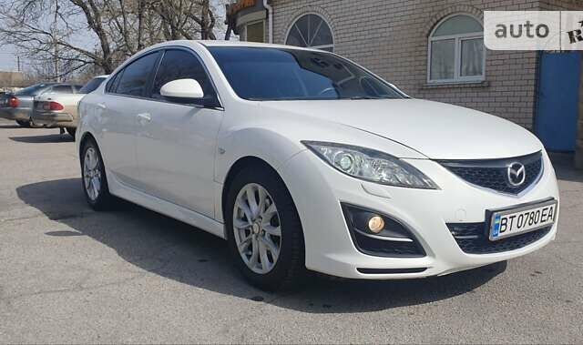 Білий Мазда 6, об'ємом двигуна 1.8 л та пробігом 243 тис. км за 7950 $, фото 7 на Automoto.ua