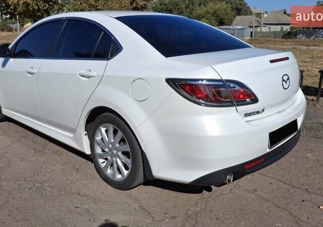 Белый Мазда 6, объемом двигателя 2 л и пробегом 71 тыс. км за 9250 $, фото 72 на Automoto.ua