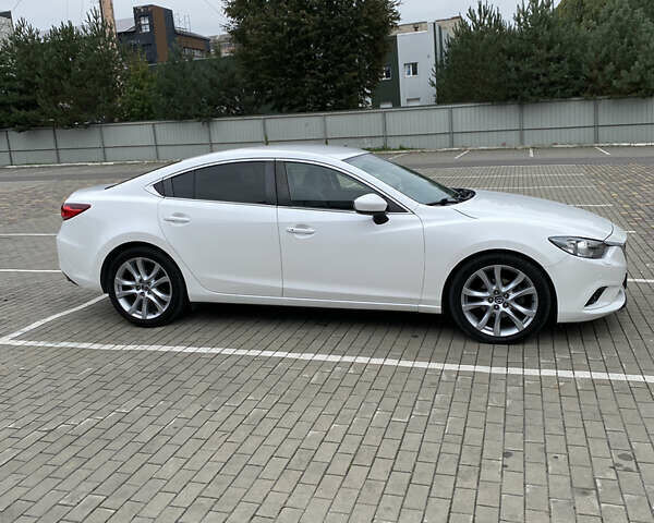 Белый Мазда 6, объемом двигателя 2.19 л и пробегом 214 тыс. км за 11600 $, фото 15 на Automoto.ua