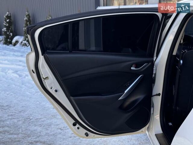 Білий Мазда 6, об'ємом двигуна 2 л та пробігом 173 тис. км за 12399 $, фото 65 на Automoto.ua