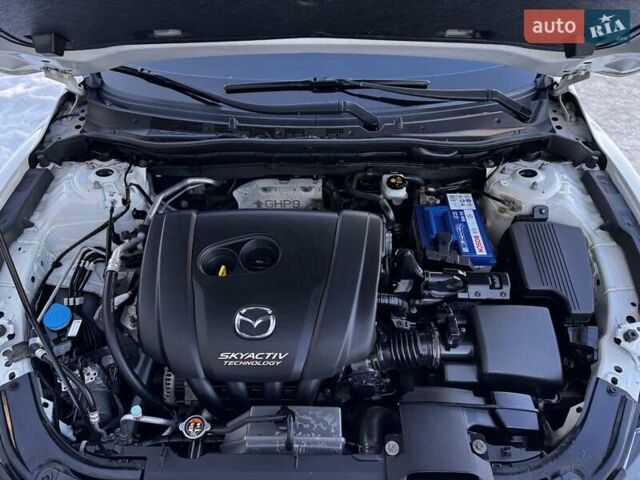 Білий Мазда 6, об'ємом двигуна 2 л та пробігом 173 тис. км за 12399 $, фото 74 на Automoto.ua