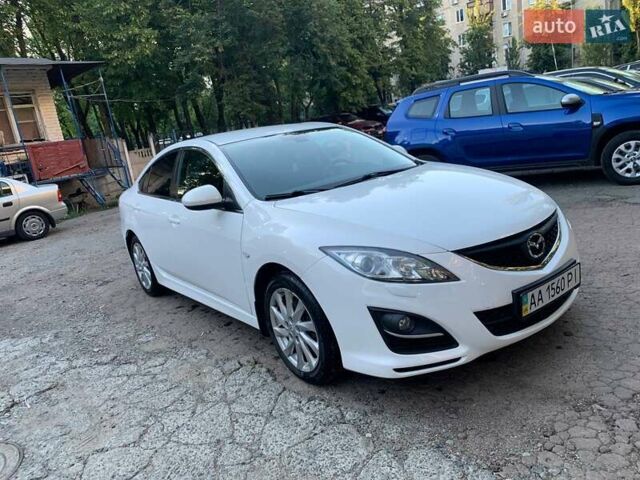 Белый Мазда 6, объемом двигателя 2 л и пробегом 122 тыс. км за 10500 $, фото 1 на Automoto.ua