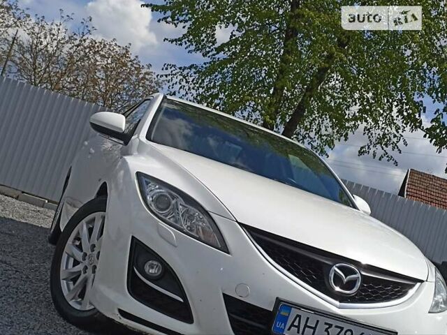 Білий Мазда 6, об'ємом двигуна 2 л та пробігом 198 тис. км за 8999 $, фото 21 на Automoto.ua