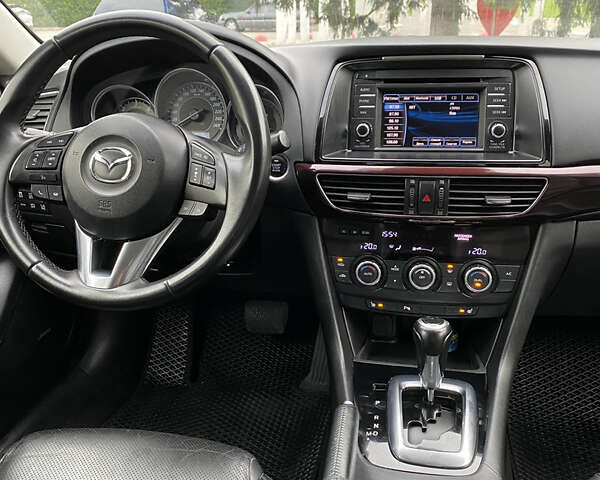 Белый Мазда 6, объемом двигателя 2.19 л и пробегом 214 тыс. км за 11600 $, фото 20 на Automoto.ua