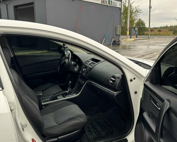 Белый Мазда 6, объемом двигателя 2 л и пробегом 340 тыс. км за 4950 $, фото 16 на Automoto.ua