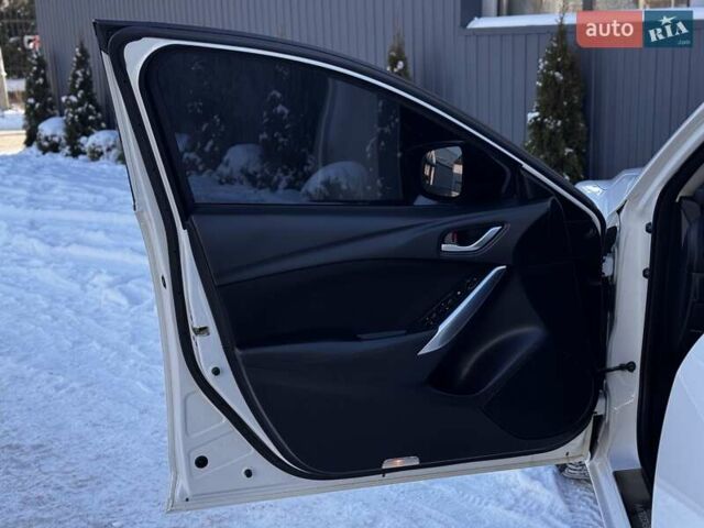 Білий Мазда 6, об'ємом двигуна 2 л та пробігом 173 тис. км за 12399 $, фото 39 на Automoto.ua