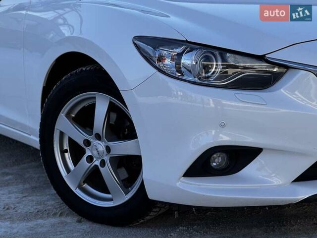 Білий Мазда 6, об'ємом двигуна 2 л та пробігом 173 тис. км за 12399 $, фото 8 на Automoto.ua