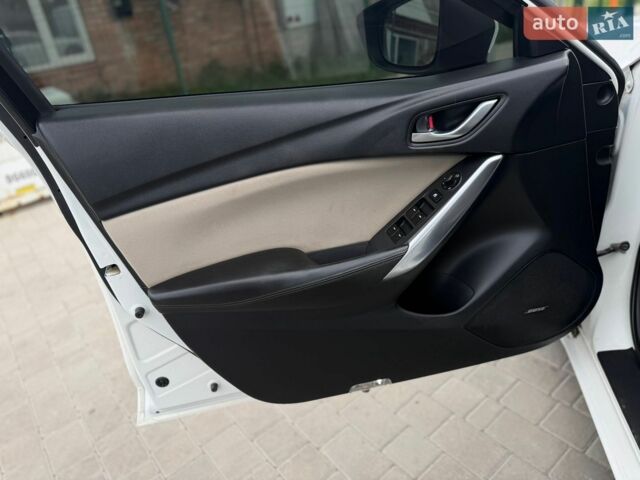 Білий Мазда 6, об'ємом двигуна 2 л та пробігом 223 тис. км за 8950 $, фото 11 на Automoto.ua