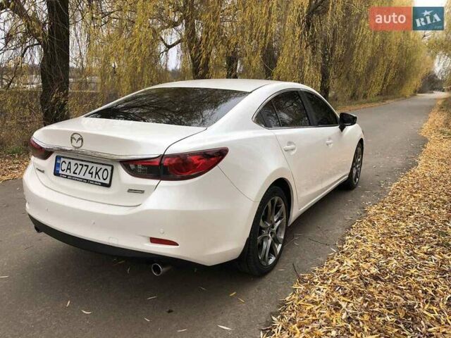 Білий Мазда 6, об'ємом двигуна 2 л та пробігом 163 тис. км за 12150 $, фото 2 на Automoto.ua