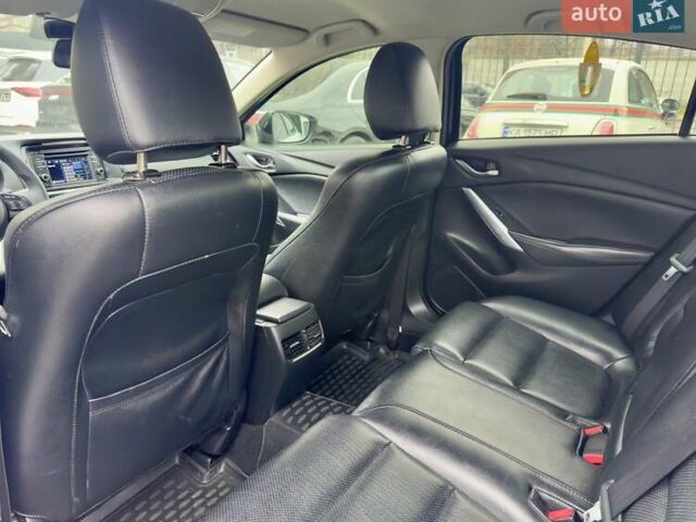 Белый Мазда 6, объемом двигателя 2 л и пробегом 171 тыс. км за 10900 $, фото 18 на Automoto.ua