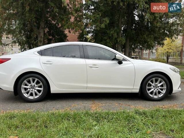 Білий Мазда 6, об'ємом двигуна 2 л та пробігом 171 тис. км за 11000 $, фото 14 на Automoto.ua