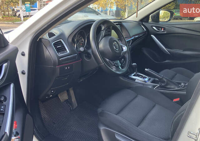 Білий Мазда 6, об'ємом двигуна 2.49 л та пробігом 200 тис. км за 12000 $, фото 5 на Automoto.ua