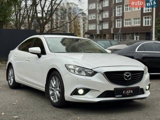 Белый Мазда 6, объемом двигателя 2 л и пробегом 171 тыс. км за 10900 $, фото 7 на Automoto.ua