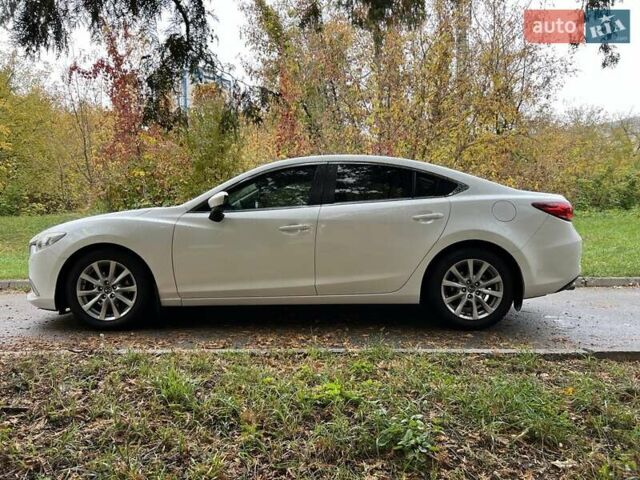 Білий Мазда 6, об'ємом двигуна 2 л та пробігом 171 тис. км за 11000 $, фото 17 на Automoto.ua
