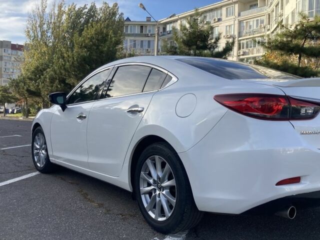 Белый Мазда 6, объемом двигателя 2.5 л и пробегом 200 тыс. км за 12500 $, фото 2 на Automoto.ua