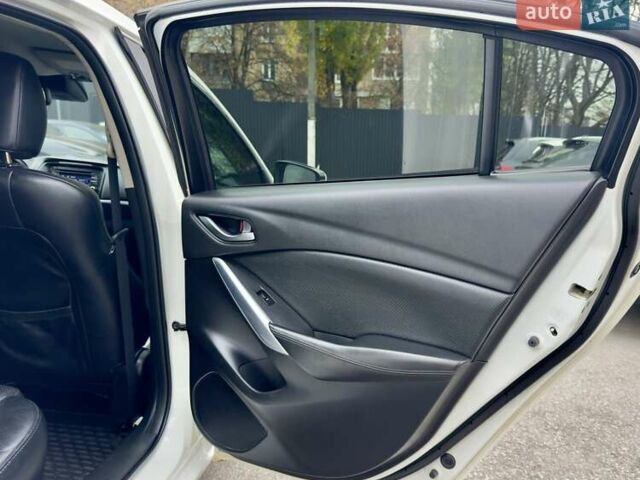 Белый Мазда 6, объемом двигателя 2 л и пробегом 171 тыс. км за 10900 $, фото 20 на Automoto.ua