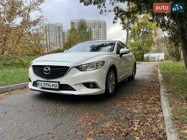 Білий Мазда 6, об'ємом двигуна 2 л та пробігом 171 тис. км за 11000 $, фото 19 на Automoto.ua