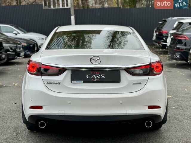 Белый Мазда 6, объемом двигателя 2 л и пробегом 171 тыс. км за 10900 $, фото 12 на Automoto.ua