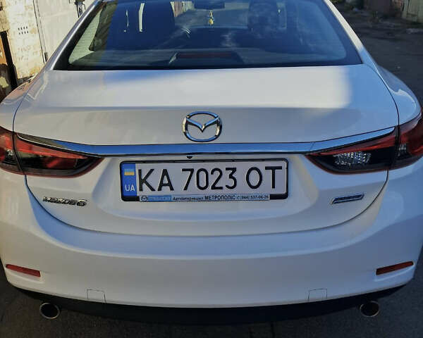 Белый Мазда 6, объемом двигателя 2 л и пробегом 176 тыс. км за 12800 $, фото 5 на Automoto.ua