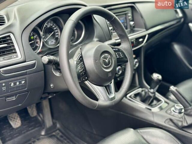 Белый Мазда 6, объемом двигателя 2 л и пробегом 171 тыс. км за 10900 $, фото 4 на Automoto.ua