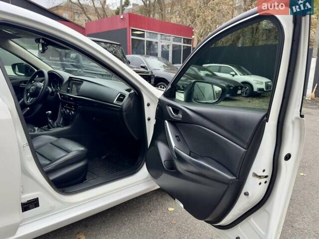 Белый Мазда 6, объемом двигателя 2 л и пробегом 171 тыс. км за 10900 $, фото 22 на Automoto.ua