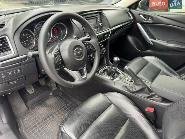 Белый Мазда 6, объемом двигателя 2 л и пробегом 171 тыс. км за 10900 $, фото 16 на Automoto.ua