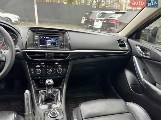 Белый Мазда 6, объемом двигателя 2 л и пробегом 171 тыс. км за 10900 $, фото 25 на Automoto.ua