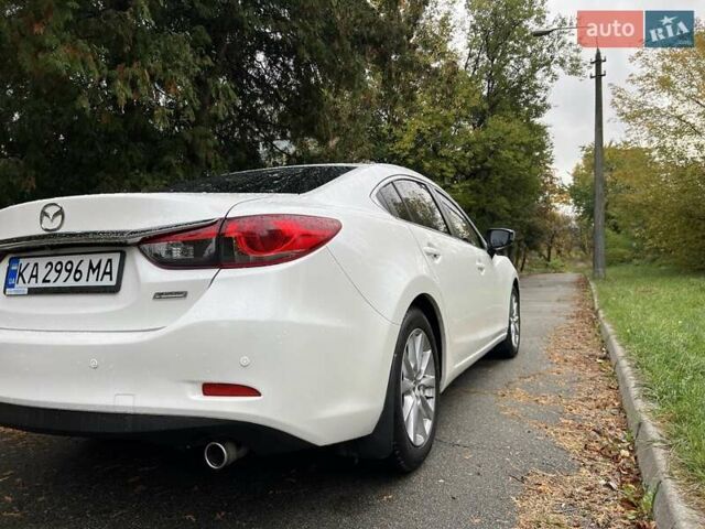 Білий Мазда 6, об'ємом двигуна 2 л та пробігом 171 тис. км за 11000 $, фото 15 на Automoto.ua