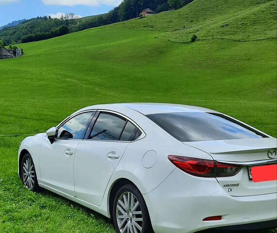 Белый Мазда 6, объемом двигателя 2.49 л и пробегом 225 тыс. км за 10500 $, фото 4 на Automoto.ua