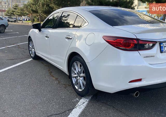 Білий Мазда 6, об'ємом двигуна 2.49 л та пробігом 200 тис. км за 12000 $, фото 4 на Automoto.ua