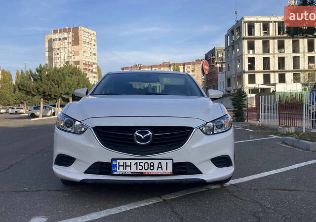 Білий Мазда 6, об'ємом двигуна 2.49 л та пробігом 200 тис. км за 12000 $, фото 1 на Automoto.ua