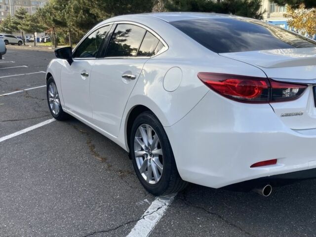 Белый Мазда 6, объемом двигателя 2.5 л и пробегом 200 тыс. км за 12500 $, фото 4 на Automoto.ua