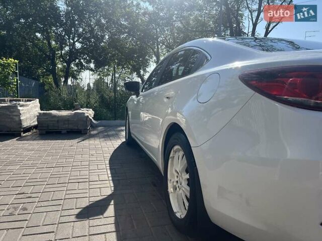 Білий Мазда 6, об'ємом двигуна 2 л та пробігом 171 тис. км за 11000 $, фото 10 на Automoto.ua