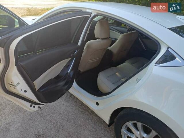 Білий Мазда 6, об'ємом двигуна 2.49 л та пробігом 200 тис. км за 11200 $, фото 11 на Automoto.ua