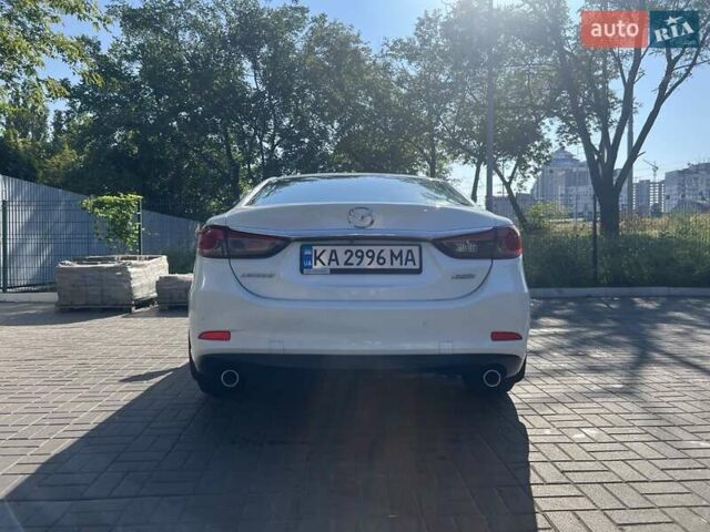 Білий Мазда 6, об'ємом двигуна 2 л та пробігом 171 тис. км за 11000 $, фото 13 на Automoto.ua