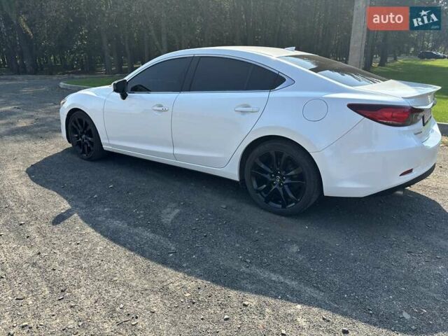 Белый Мазда 6, объемом двигателя 2.5 л и пробегом 230 тыс. км за 11000 $, фото 20 на Automoto.ua