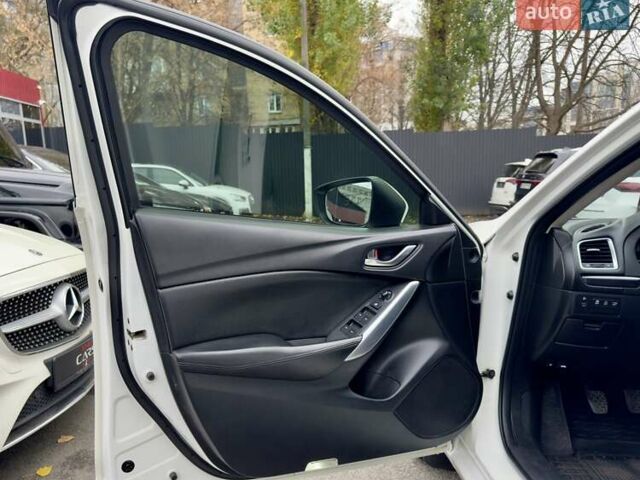 Белый Мазда 6, объемом двигателя 2 л и пробегом 171 тыс. км за 10900 $, фото 17 на Automoto.ua