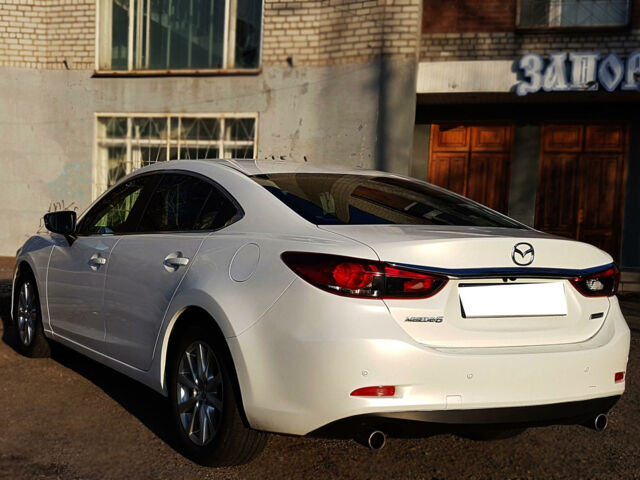 Білий Мазда 6, об'ємом двигуна 2 л та пробігом 94 тис. км за 15800 $, фото 13 на Automoto.ua