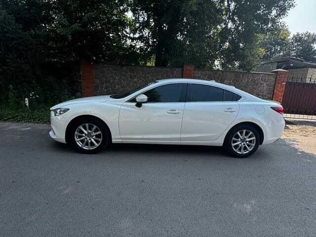 Білий Мазда 6, об'ємом двигуна 2 л та пробігом 167 тис. км за 11000 $, фото 9 на Automoto.ua