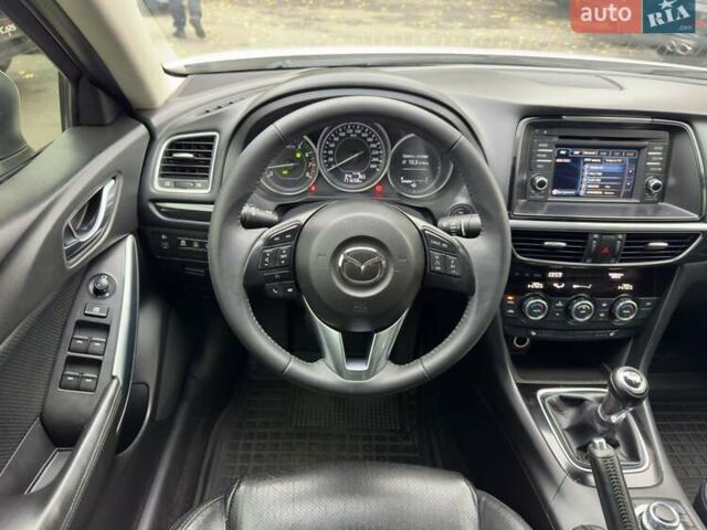 Белый Мазда 6, объемом двигателя 2 л и пробегом 171 тыс. км за 10900 $, фото 26 на Automoto.ua