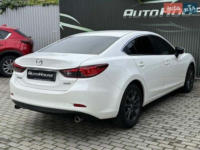 Білий Мазда 6, об'ємом двигуна 2 л та пробігом 145 тис. км за 12900 $, фото 34 на Automoto.ua