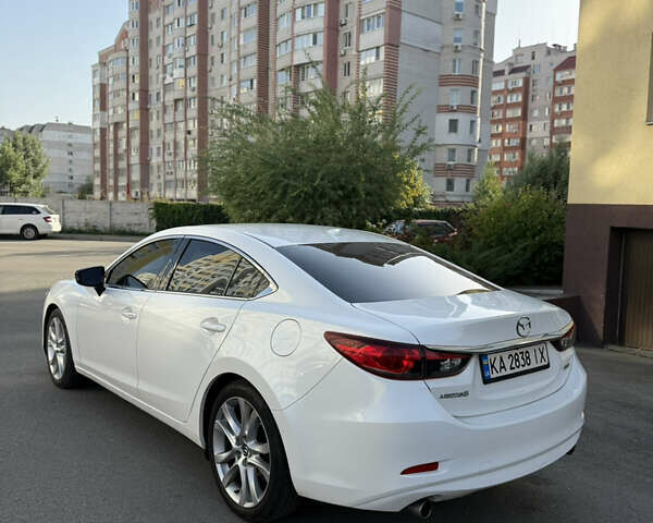 Белый Мазда 6, объемом двигателя 2.49 л и пробегом 218 тыс. км за 10700 $, фото 1 на Automoto.ua