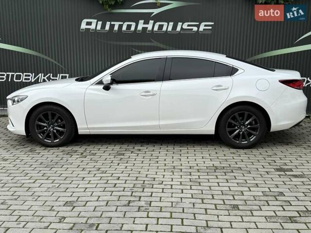 Білий Мазда 6, об'ємом двигуна 2 л та пробігом 145 тис. км за 12900 $, фото 23 на Automoto.ua