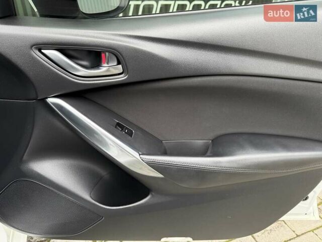 Білий Мазда 6, об'ємом двигуна 2 л та пробігом 145 тис. км за 12900 $, фото 40 на Automoto.ua