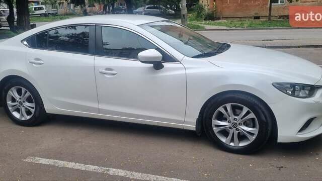 Білий Мазда 6, об'ємом двигуна 2 л та пробігом 112 тис. км за 12300 $, фото 5 на Automoto.ua