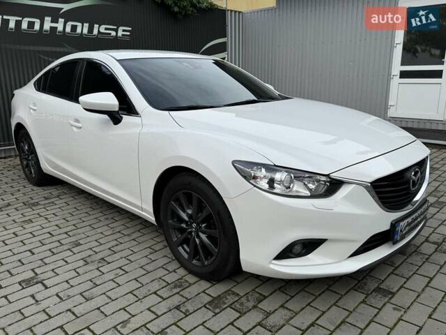 Білий Мазда 6, об'ємом двигуна 2 л та пробігом 145 тис. км за 12900 $, фото 18 на Automoto.ua