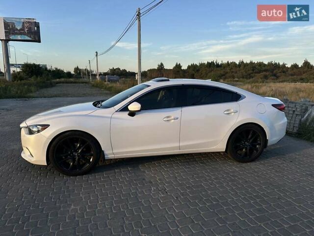 Білий Мазда 6, об'ємом двигуна 2.49 л та пробігом 164 тис. км за 12500 $, фото 4 на Automoto.ua