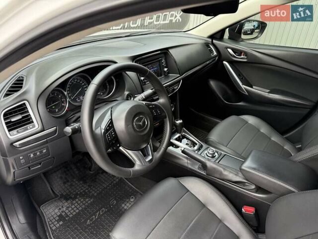 Білий Мазда 6, об'ємом двигуна 2 л та пробігом 145 тис. км за 12900 $, фото 54 на Automoto.ua