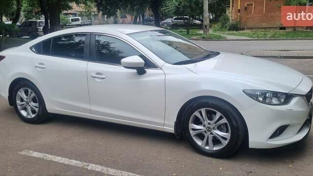 Білий Мазда 6, об'ємом двигуна 2 л та пробігом 112 тис. км за 12300 $, фото 2 на Automoto.ua
