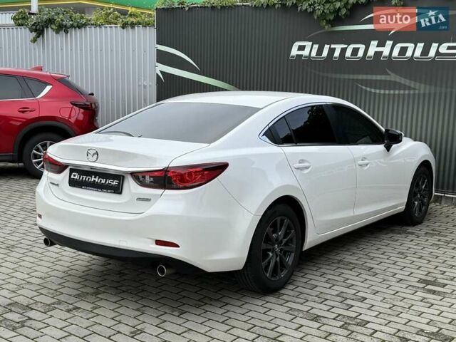 Білий Мазда 6, об'ємом двигуна 2 л та пробігом 145 тис. км за 12900 $, фото 27 на Automoto.ua